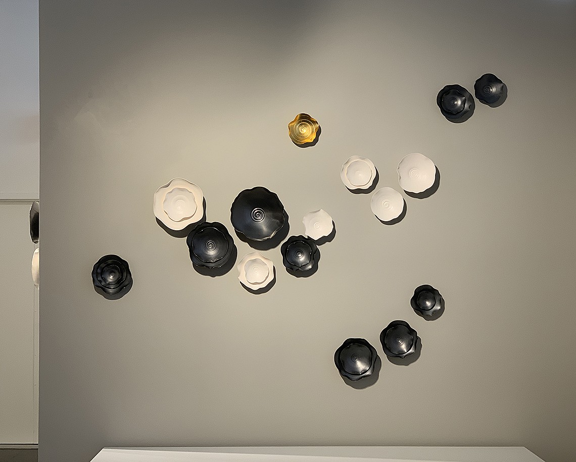 Lucrecia Waggoner, Intertwined II
Gunmetal glazed porcelain, natural porcelain and  bronze leaf , Size variable