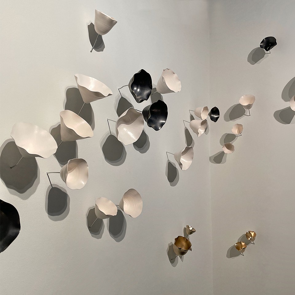 Lucrecia Waggoner, Tulip Field (Sold)
Natural porcelain, gun metal glaze & moongold leaf, dimensions variable (60x130" as shown)